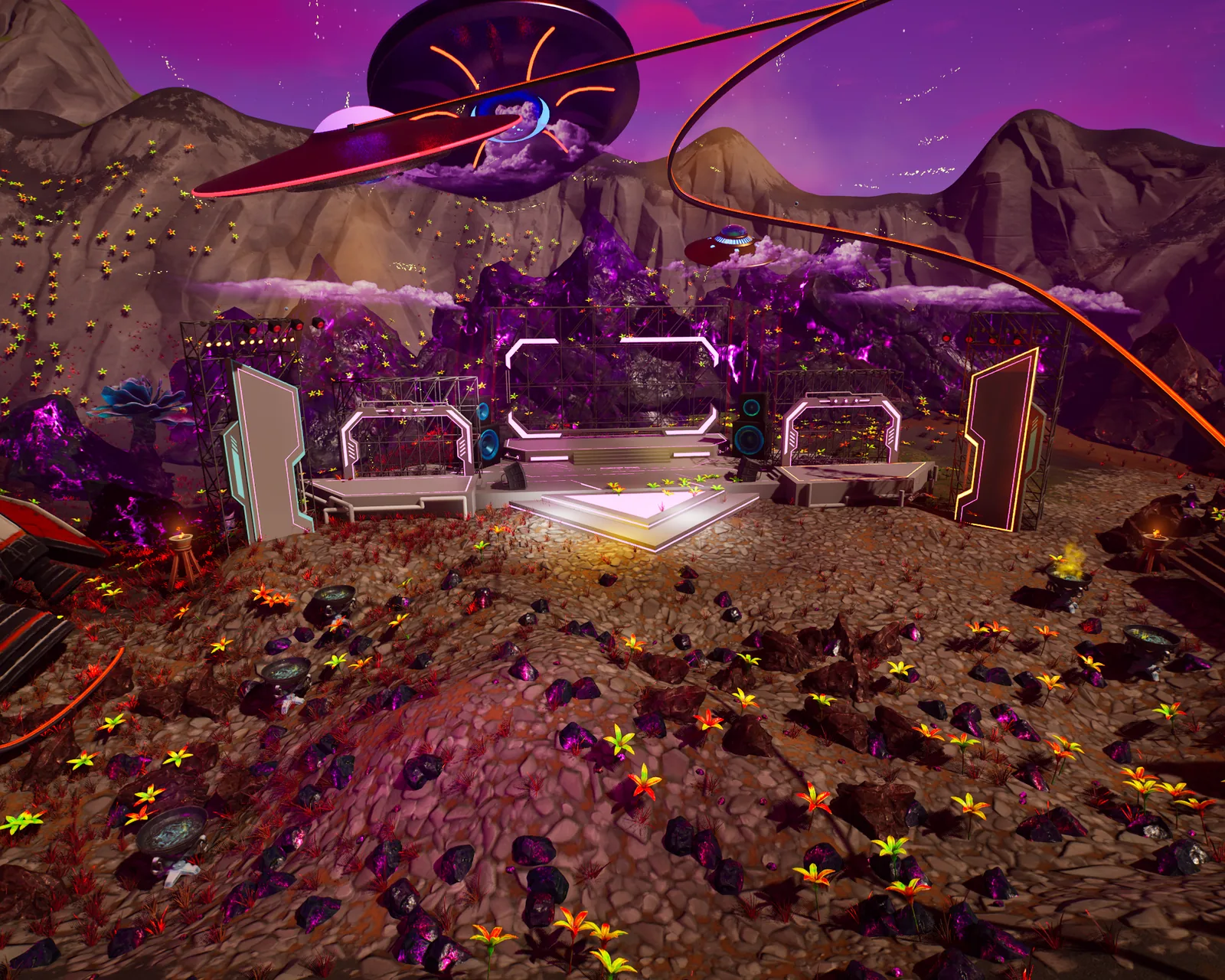 A concert stage built inside Fortnite, lit up at night